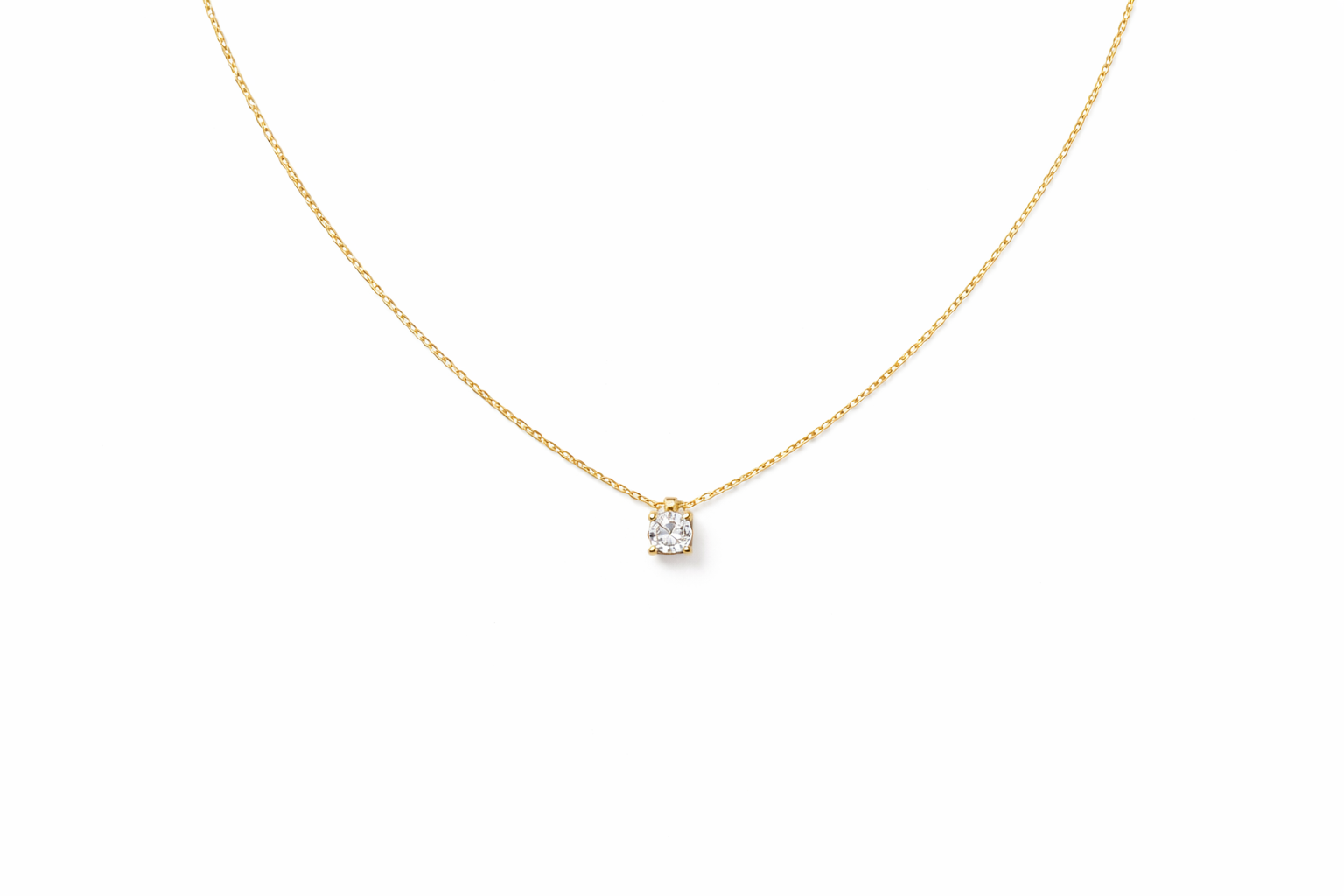 colgante de oro amarillo con punto de luz