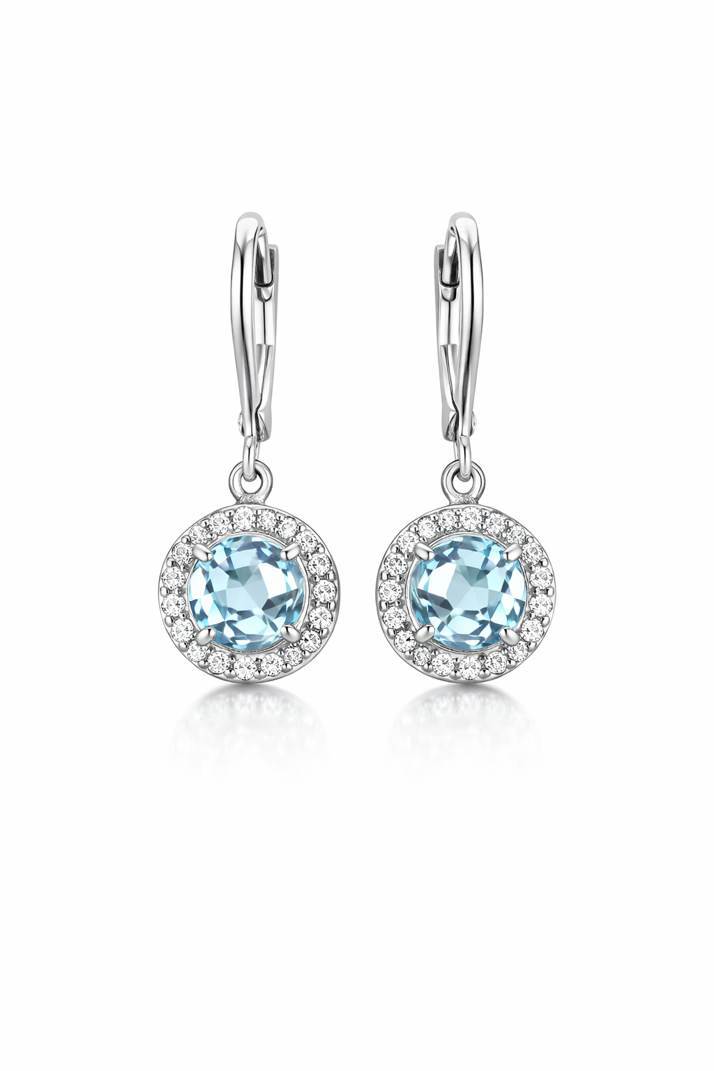 Aros colgantes de oro blanco y topacio azul