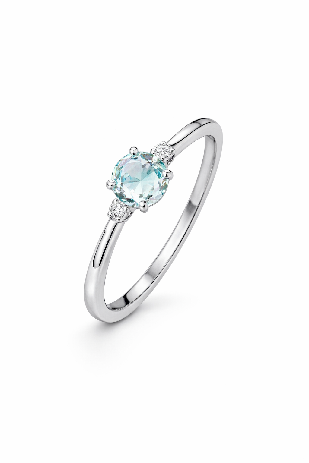 anillo de oro blanco con topacio azul