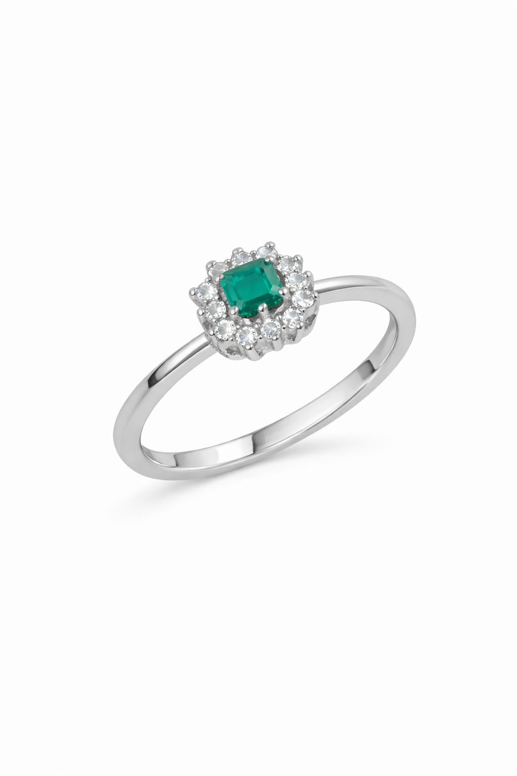 anillo de oro blanco con esmeralda y diamantes