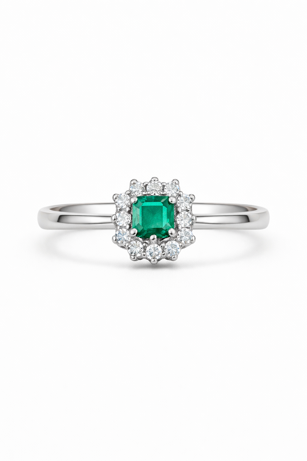 anillo de oro blanco con esmeralda y diamantes